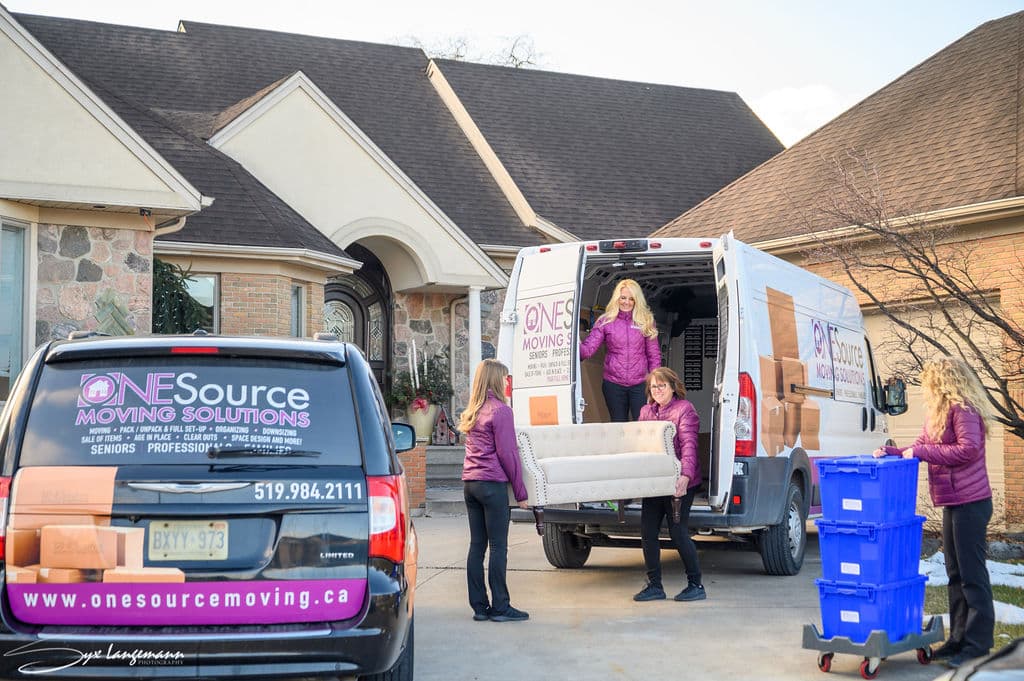 ONESource Moving Solutions loading up vans